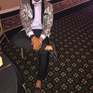 Sliver and black blazer.